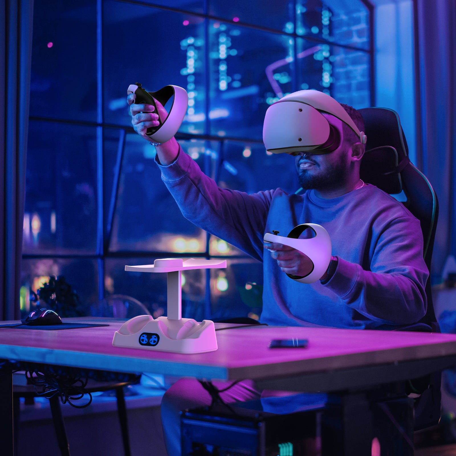 A man is playing VR games with a Controller Charging Station placed on the table.