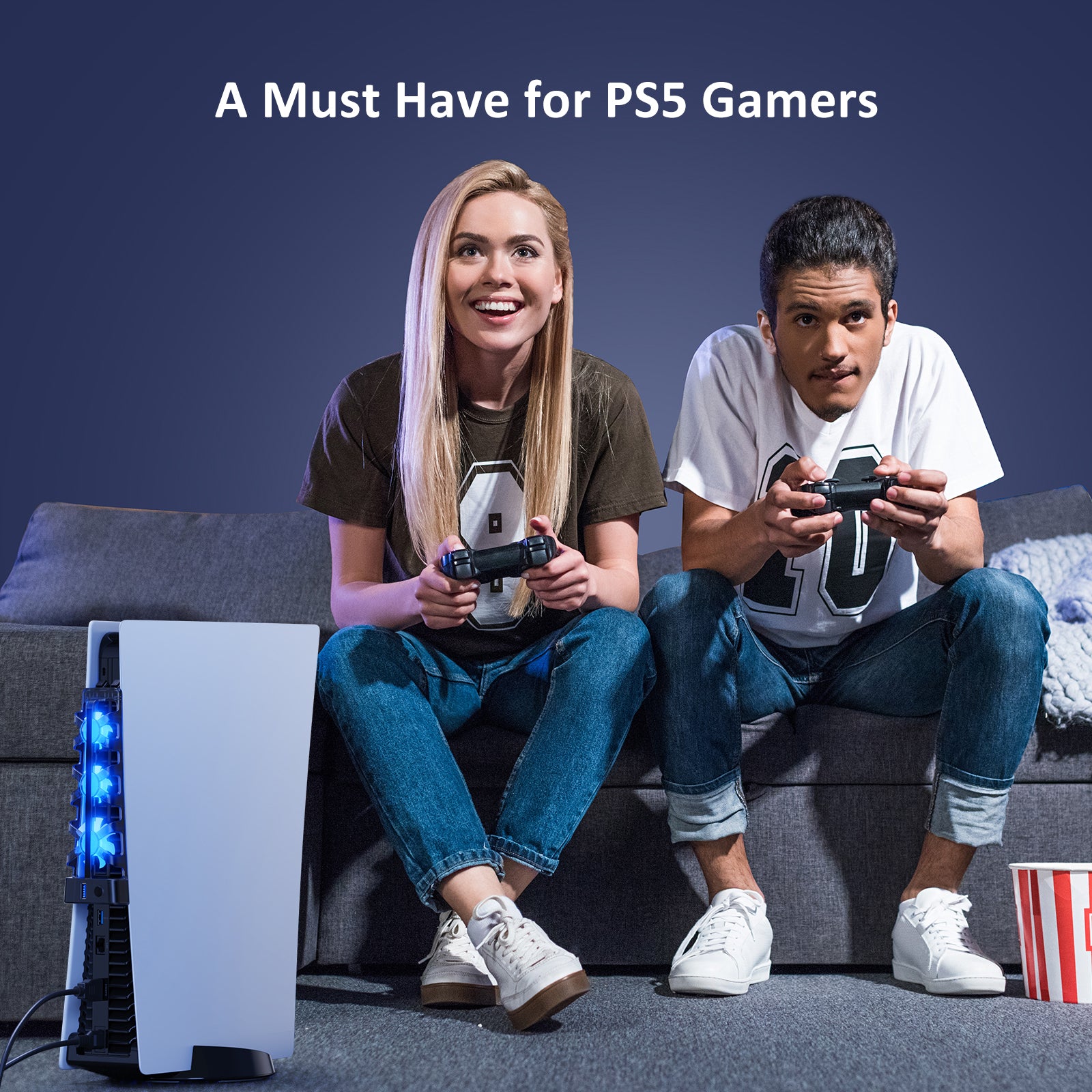 A couple is playing games on a PS5 with the cooling fan already attached.